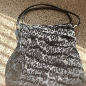 Suede coach bag with satin interior